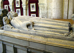 The tomb of King Athelstan in Malmesbury Abbey, Malmesbury, England. There is nothing in the tomb beneath the statue, the relics of the king having been lost in the Dissolution of the Monasteries in 1539. The remains may have been destroyed by the King's Commissioners or hidden before the Commissioners arrived to close down the Abbey.